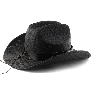 Detail of black woven cowboy hat with studded leather band and side tassel detail