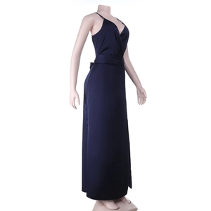 Detail of navy blue satin slip dress featuring a V-neckline and elegant side slit design
