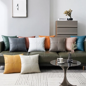 Modern Nordic tech-fabric throw pillows in multiple colors arranged on a luxury sofa