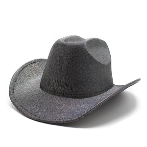 Macro shot of black iridescent glitter surface on classic Western cowboy party hat