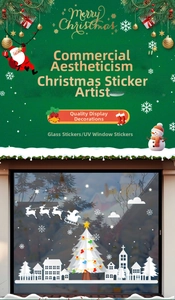 Detail of white Christmas tree stickers and Santa sleigh decals on a glass window