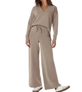 Detailed texture of women's knitted lounge set with V-neck top and drawstring wide leg pants
