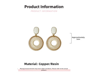 Macro view of 5cm geometric hoop earrings with resin oval studs and gold woven pendants