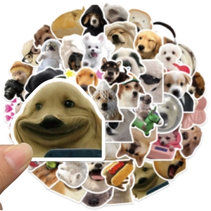 Close-up of funny golden retriever meme sticker from a 50-piece waterproof dog decal set
