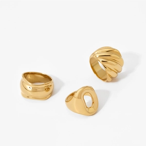 Minimalist gold stainless steel ring set with spiral texture and irregular wave designs