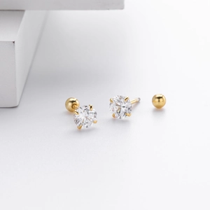 Close-up of S925 sterling silver screw back stud earrings with 4-prong zircon settings