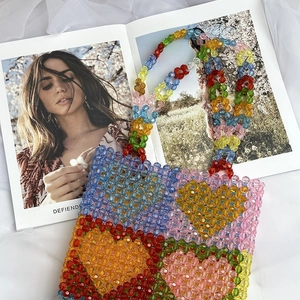 Colorful heart patterned beaded tote bag with stylish top handle and acrylic beads