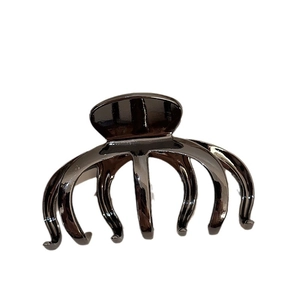 Large metal shark hair claw clip in dark metallic finish for thick hair on white background