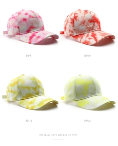 Variety of retro tie-dye baseball caps with unique graffiti patterns for outdoors