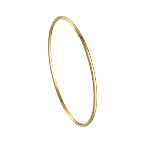 Macro shot of 2mm slim golden minimalist bangle showing polished stainless steel finish