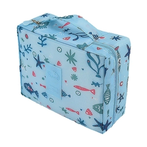 Trousse de toilette étanche avec motif océan bleu et poignée pour le voyage