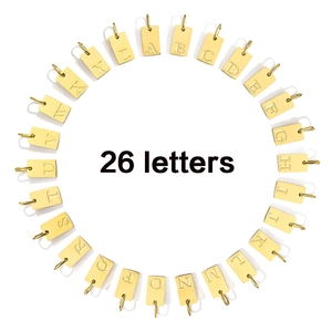 Set of 26 gold rectangular alphabet charms in stainless steel arranged in a circle