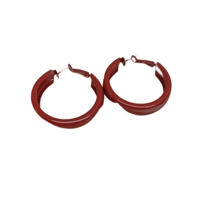 Classic deep red round hoop earrings with glossy metallic finish and secure metal clasps