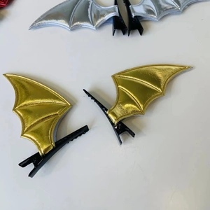 Halloween bat wing hair clips in gold and silver metallic faux leather with duckbill clips