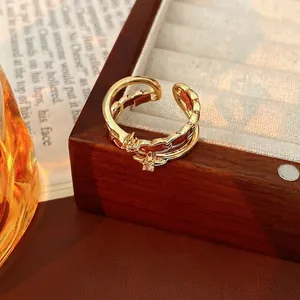 Vintage style 18K gold plated open ring with double-layer wavy design and zircon stones