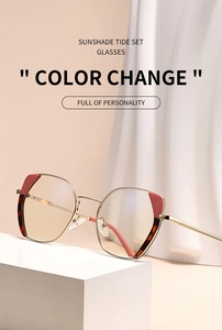Detail of trendy geometric cat-eye glasses frames in gold and tortoiseshell finish