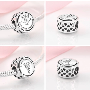 Detailed macro view of S925 sterling silver career charms on a bracelet for DIY jewelry