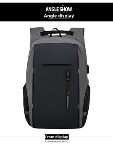 Front view of a gray business laptop backpack featuring a built-in USB charging port