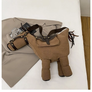 Top view of creative horse-shaped brown canvas crossbody bag with leather strap and fringe
