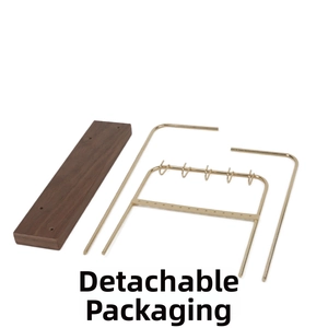 Disassembled jewelry display stand with walnut base and gold metal organizers