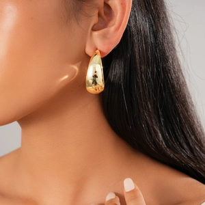 Polished gold teardrop earrings featuring a minimalist geometric design for women