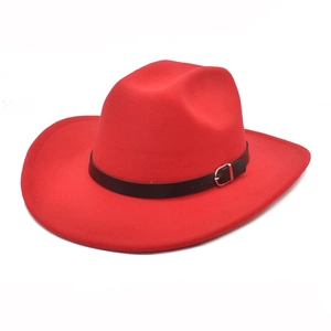 Detail of red wool fedora with wide brim, black leather band, and silver buckle closure