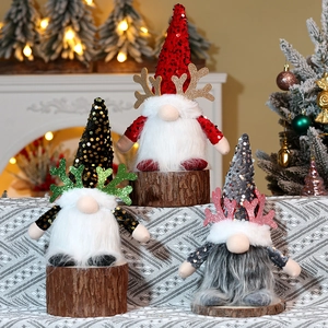 Three sequined Christmas gnomes with antlers and plush beards for holiday decor