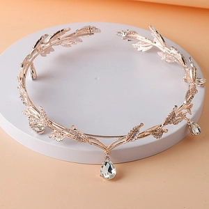 Detail of rose gold leaf crown headband with rhinestones and a water drop pendant