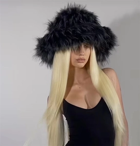 Detailed close-up of a black faux fur bucket hat featuring long plush texture on model