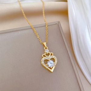 Elegant gold titanium necklace with hollow heart crown pendant and sparkling diamonds