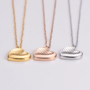 Unique honeycomb heart pendant necklaces in gold, rose gold and silver finishes
