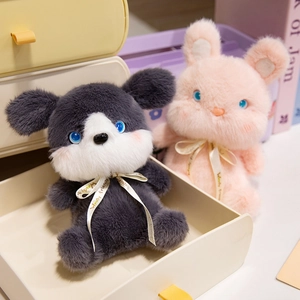 Cute husky and rabbit plush toys with Woody Friends ribbons in a soft cozy drawer