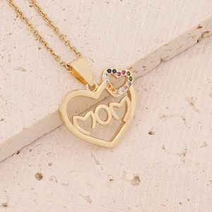 Detail of 18K gold heart necklace with MOM engraving and colorful zircons