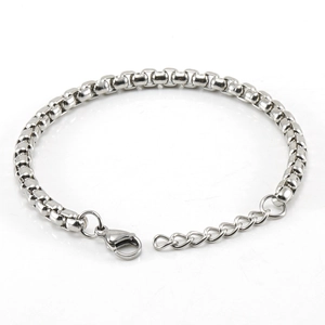 Detail of silver stainless steel box chain bracelet with lobster clasp and extender