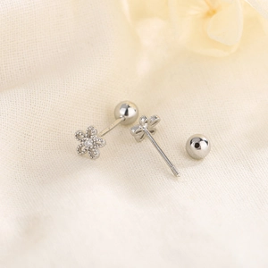 Mini silver daisy flower earrings with zircon center and secure screw back closure