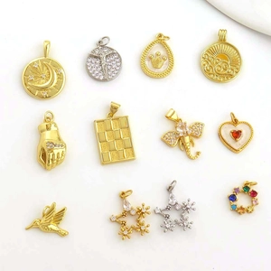 Collection of 18k gold plated charms with cubic zirconia in assorted shapes