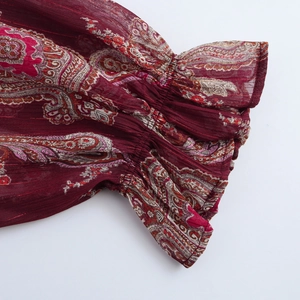 Robe longue vintage à motif paisley avec fils métalliques et poignets élastiques