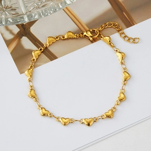 18K gold plated heart link bracelet with textured patterns and adjustable lobster clasp