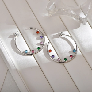 Elegant large C-shaped silver hoop earrings with six colorful sparkling round zircons