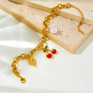 Double-layered gold-plated stainless steel bracelet with cherry and pearl pendants
