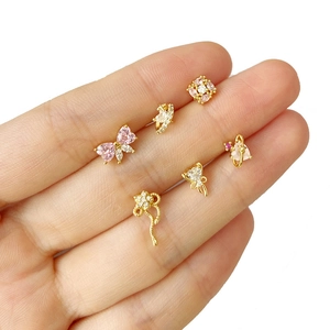Elegant six-piece gold stud earring set with pink zircon butterfly and planet designs