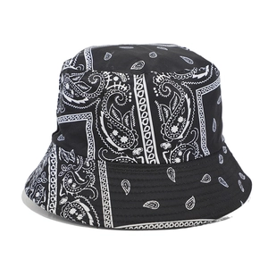 Classic black bucket hat with white paisley print for outdoor fashion and sun protection