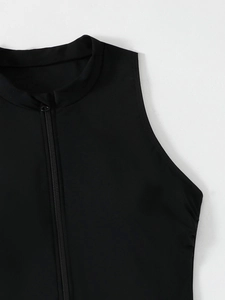 Detail view of the stand-up collar and front zipper closure on the black sleeveless swimsuit