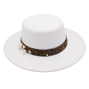 Close-up of white wool felt boater hat with leopard print band and pearl embellishments