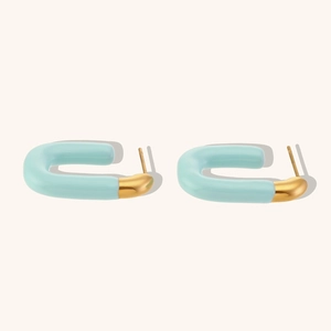 Detailed view of light blue enamel and 18K gold-plated U-shaped earrings for women