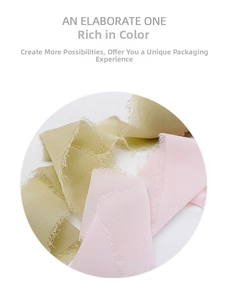 Detail view of handmade frayed edge chiffon ribbon in olive green and light pink colors