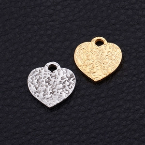 Textured heart-shaped stainless steel pendants in gold and silver finish set