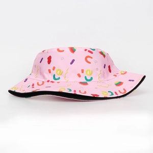 Close-up of pink bucket hat featuring colorful abstract print and nice text design