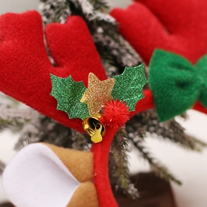 Christmas reindeer antler headband with red plush, gold bells and green holly leaves