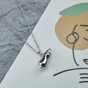 Collier hip hop argenté avec pendentif cacahuète et perle sur une chaîne fine de type O
